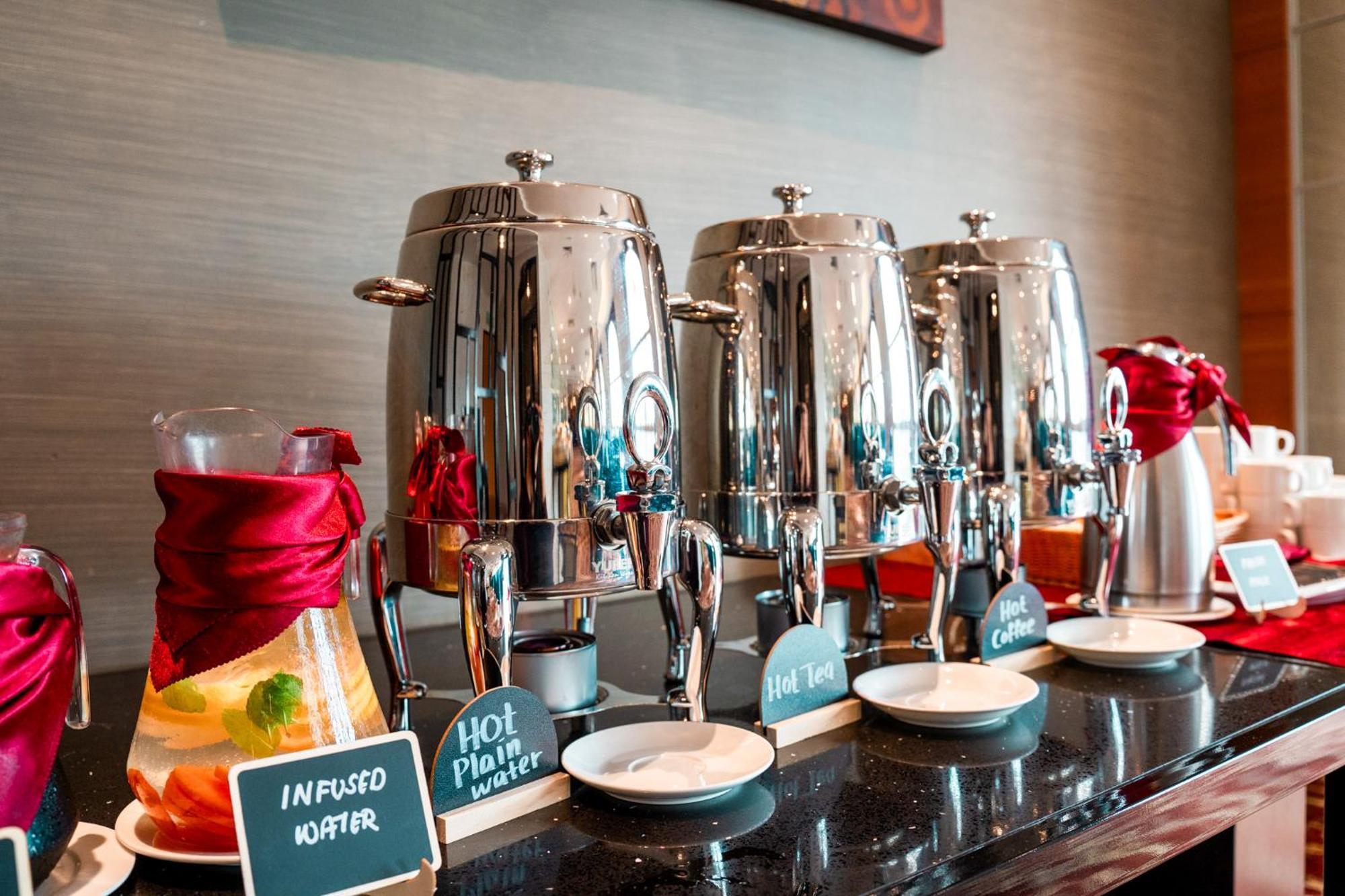 The Waterfront Hotel Kuching Exterior foto A selection of hot and cold beverages