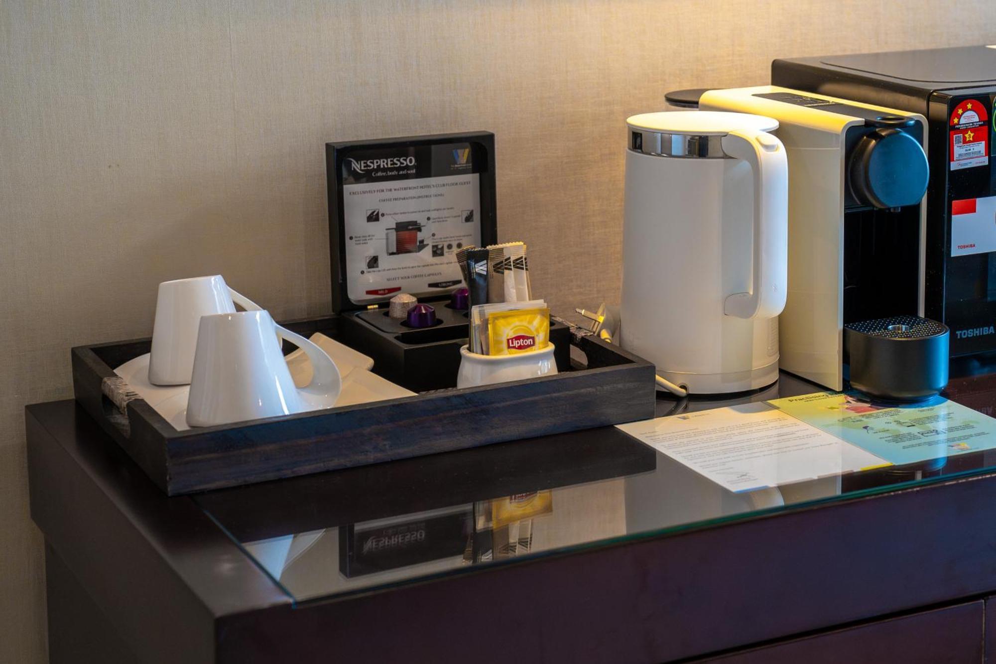 The Waterfront Hotel Kuching Exterior foto A Nespresso coffee machine in a hotel room