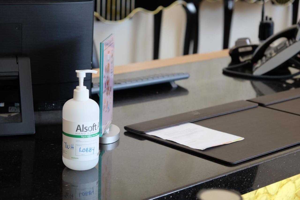 The Waterfront Hotel Kuching Exterior foto A bottle of hand sanitizer